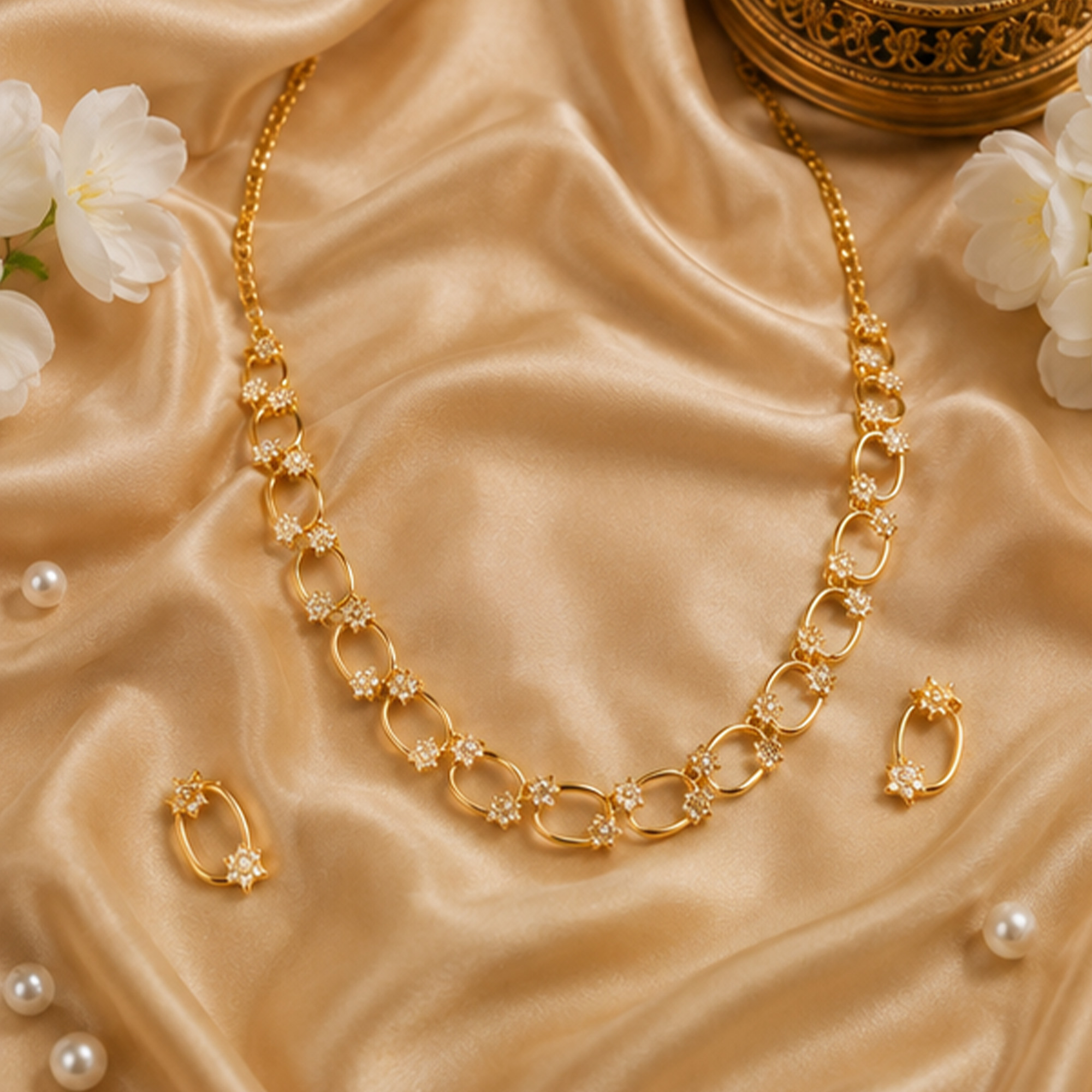 Elegant Star Link Gold Necklace Set on Silk Background