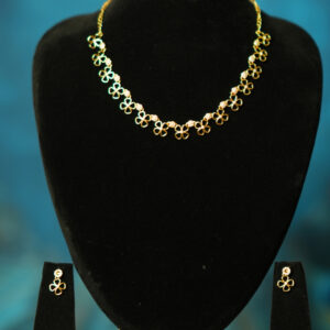 Peacock Feather Bloom Gold Necklace Set on Jewellery Bust