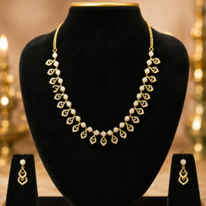 Regal Teardrop Necklace Set on Jewellery Bust