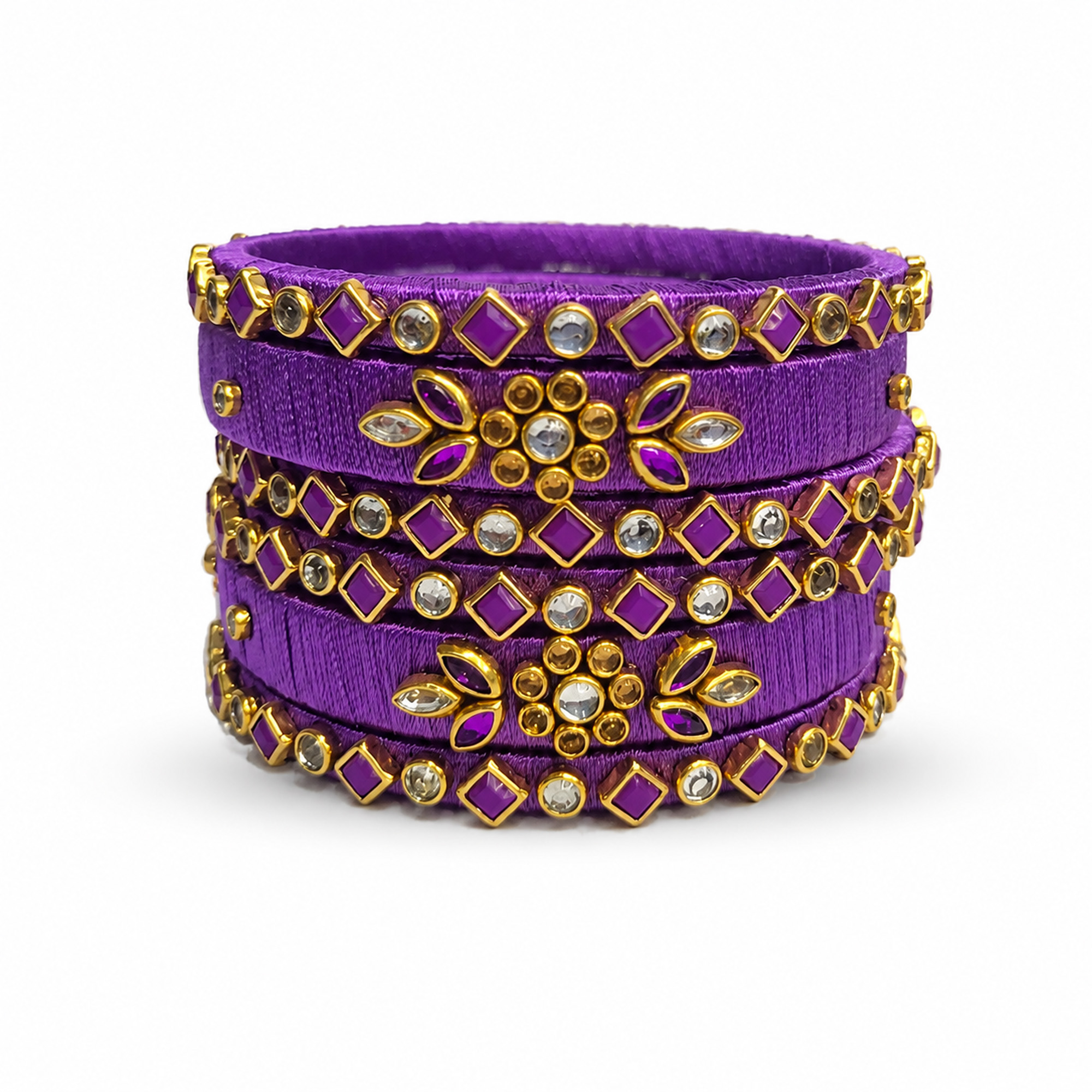 Royal purple floral silk thread bangles on a white background