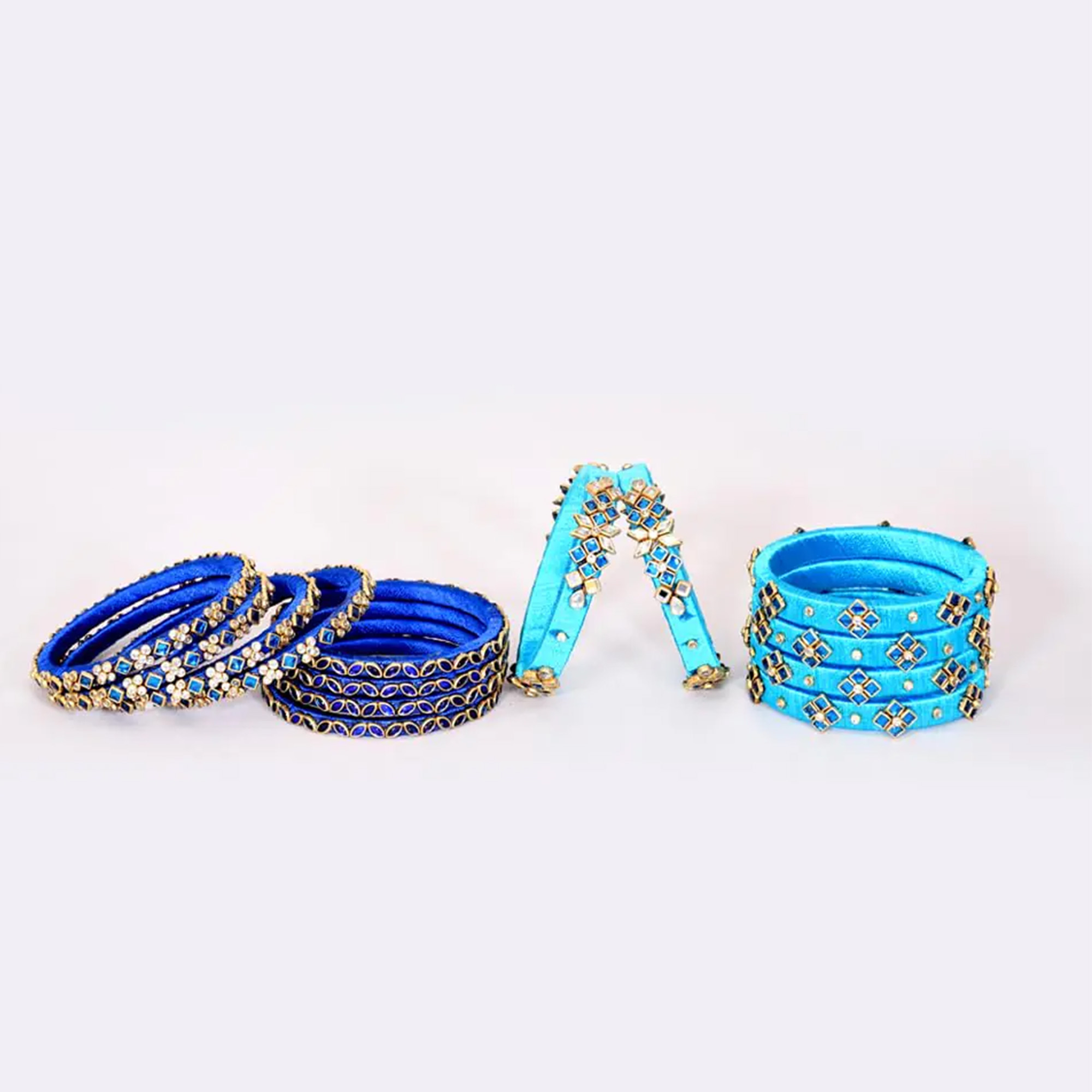 Sky blue and gold designer silk thread bangles product display